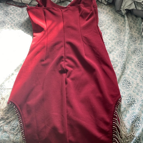 Wine red tight dress . Charms dangling from the sides to give it a sexy look . - Picture 2 of 2